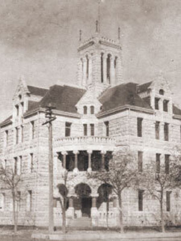 Architecture 1 Comal County Courthouse 3½ story Romanesque style building constructed with limestone in 1898